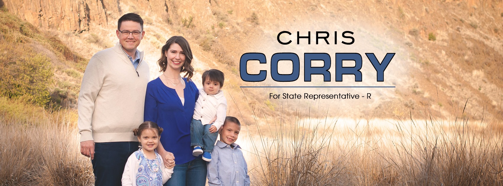 Wide campaign photo of Chris Corry and his family