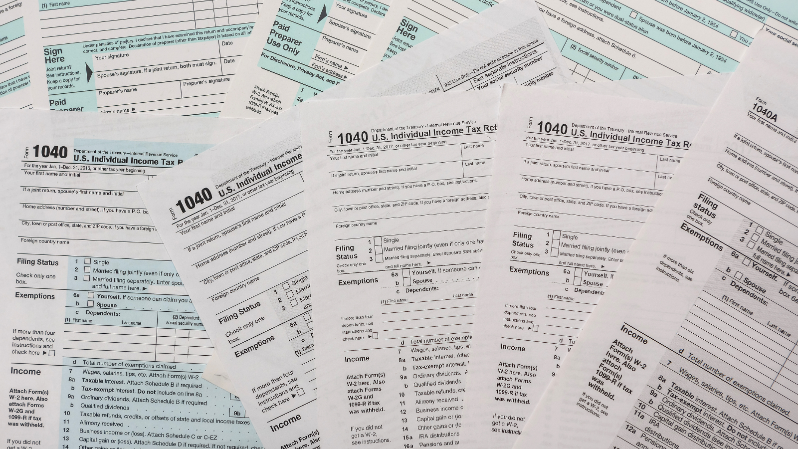 A scattered overlay of U.S. federal income tax forms, evoking the regulatory weight families face